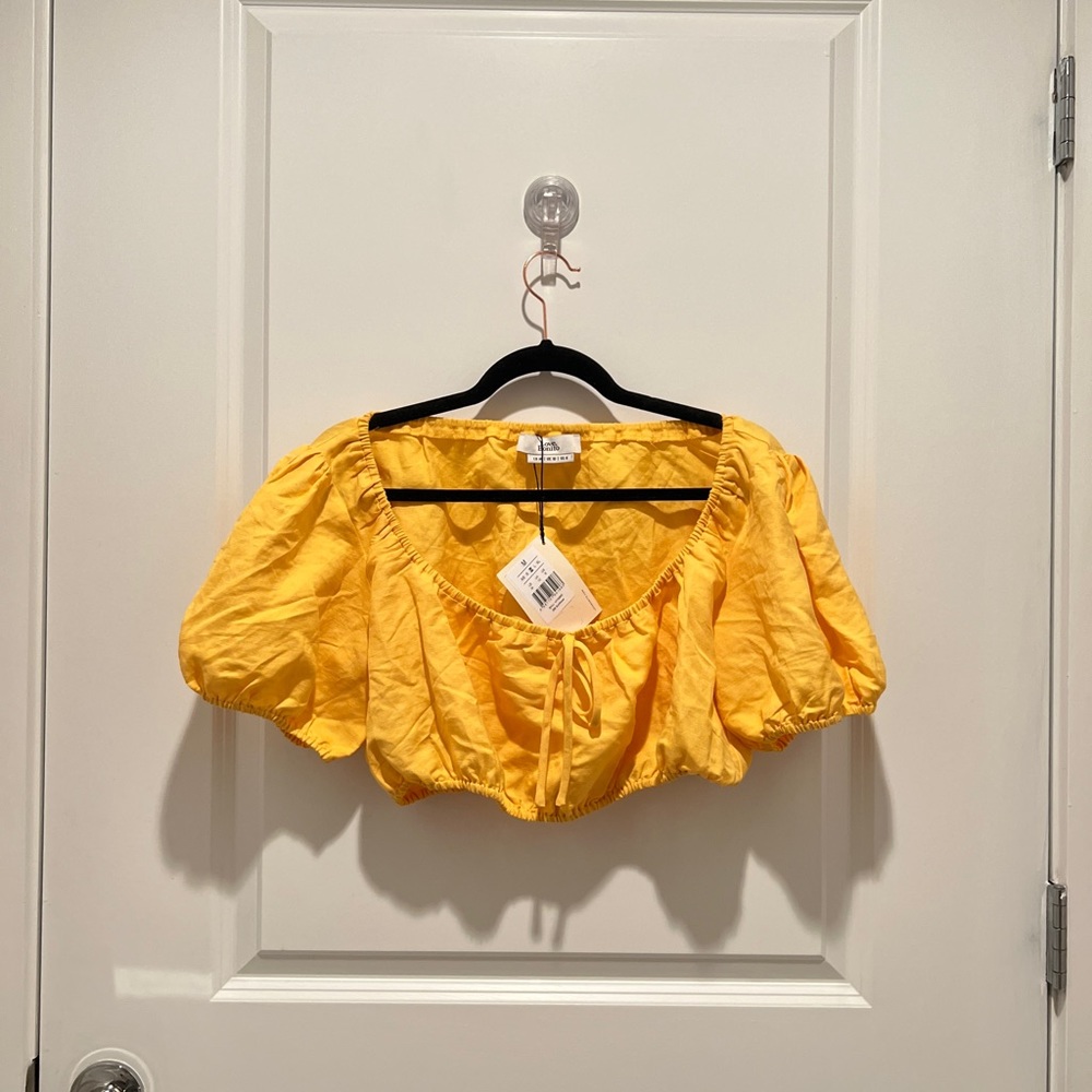 BEAND NEW NEVER WORN YELLOW CROP TOP/BLOUSE WITH LUFF SLEEVES.